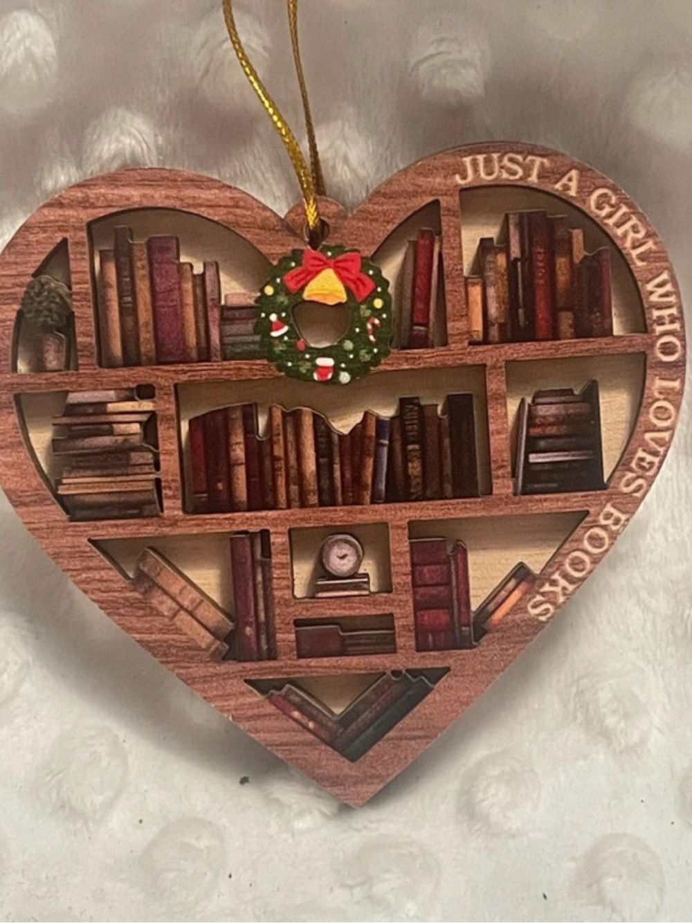 “Just A Girl Who Loves Books”. Heart Ornament in Brown with Green Wreath Accent.